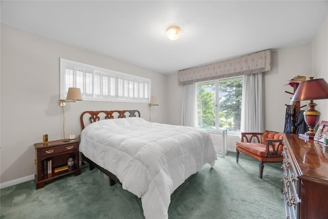 1104 Mulberry St, Tipton, IA 52772 - bedroom featuring carpet flooring and baseboards