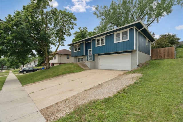 1708 Woodside Ct NW, Cedar Rapids, IA 52405 - bi-level home with an attached garage, brick siding, and driveway