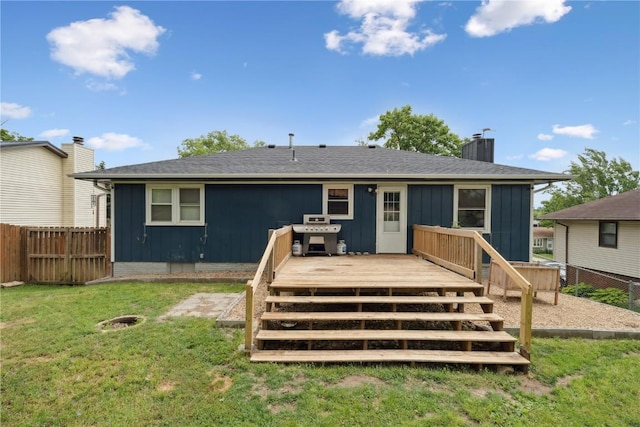 1708 Woodside Ct NW, Cedar Rapids, IA 52405 - back of property with a chimney, a wooden deck, board and batten siding, and stairway