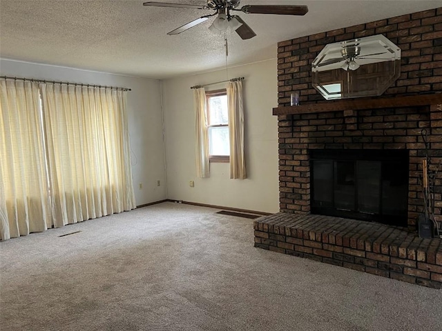 201 S 8th Ave, Vinton, IA 52349 - unfurnished living room with carpet flooring, a ceiling fan, a fireplace, and a textured ceiling