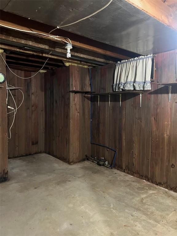 201 S 8th Ave, Vinton, IA 52349 - unfinished below grade area with wood walls