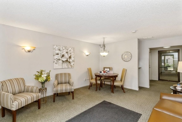 2135 1st Ave SE Unit 125, Cedar Rapids, IA 52402 - carpeted dining area featuring a textured ceiling