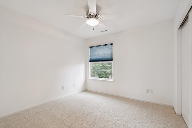4309 Woodsonia Ct NW, Cedar Rapids, IA 52405 - unfurnished room featuring light carpet and a ceiling fan