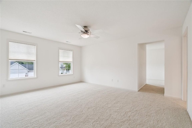 4309 Woodsonia Ct NW, Cedar Rapids, IA 52405 - empty room with carpet flooring and a ceiling fan
