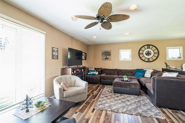 4524 Benton St, Cedar Rapids, IA 52402 - living area with wood finished floors, a ceiling fan, and recessed lighting