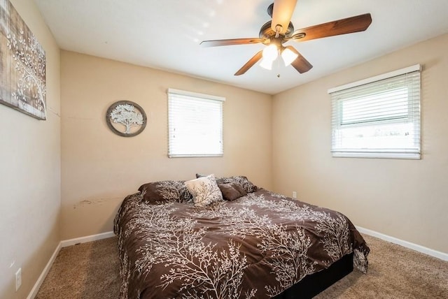 4524 Benton St, Cedar Rapids, IA 52402 - bedroom with carpet and a ceiling fan