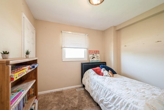 4524 Benton St, Cedar Rapids, IA 52402 - carpeted bedroom with baseboards