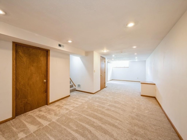 4634 Twin Pine Dr NE, Cedar Rapids, IA 52402 - finished basement featuring light carpet, recessed lighting, and stairway