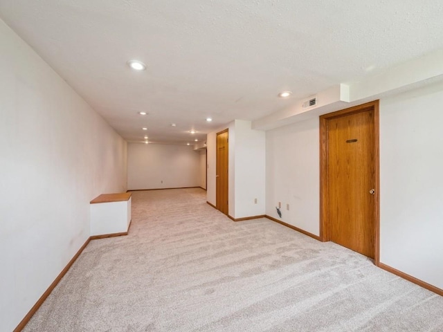 4634 Twin Pine Dr NE, Cedar Rapids, IA 52402 - empty room featuring light colored carpet and recessed lighting