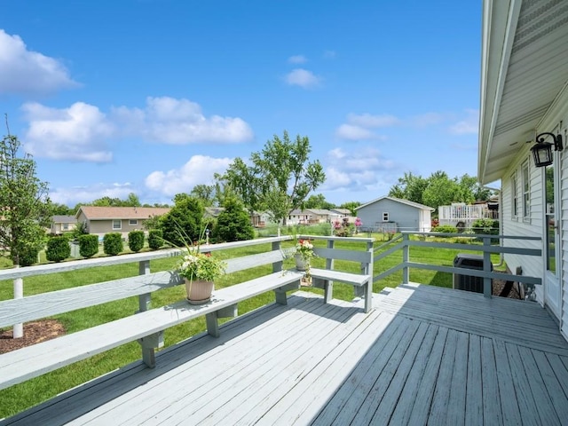 4634 Twin Pine Dr NE, Cedar Rapids, IA 52402 - wooden terrace with a yard and a residential view
