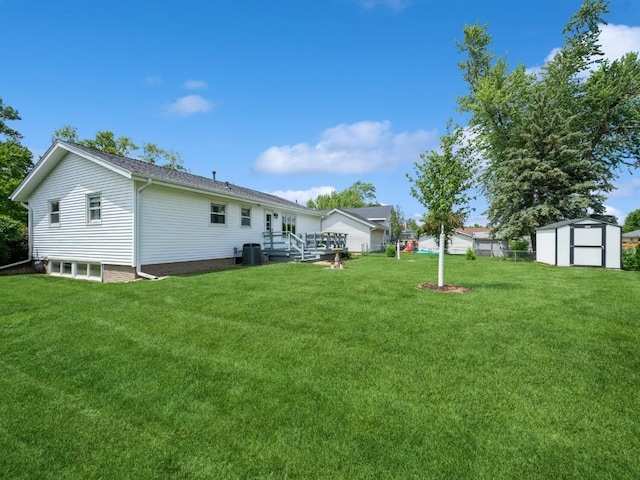 4634 Twin Pine Dr NE, Cedar Rapids, IA 52402 - view of green lawn with a shed