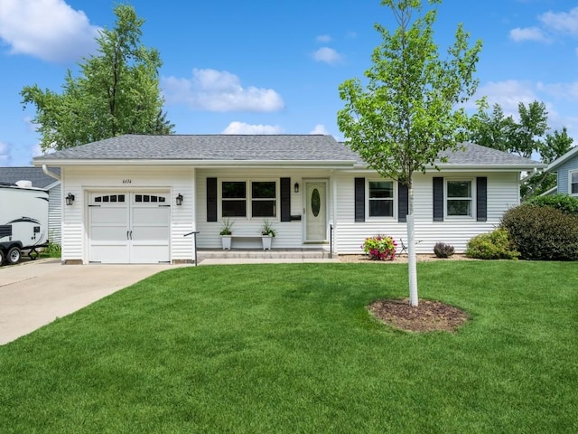 4634 Twin Pine Dr NE, Cedar Rapids, IA 52402 - single story home featuring an attached garage, driveway, a front yard, and roof with shingles