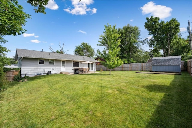 4633 White Pine Dr NE, Cedar Rapids, IA 52402 - fenced backyard with a patio and a shed