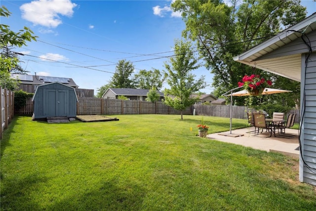 4633 White Pine Dr NE, Cedar Rapids, IA 52402 - fenced backyard with a storage shed and a patio