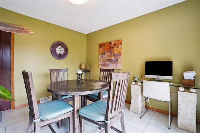 4633 White Pine Dr NE, Cedar Rapids, IA 52402 - tiled dining room featuring baseboards