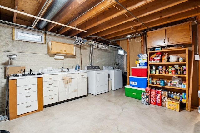 4633 White Pine Dr NE, Cedar Rapids, IA 52402 - unfinished below grade area featuring washer and dryer and brick wall