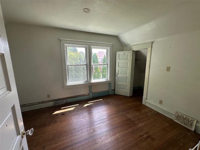 618 18th St SE, Cedar Rapids, IA 52403 - bonus room featuring lofted ceiling and hardwood / wood-style floors
