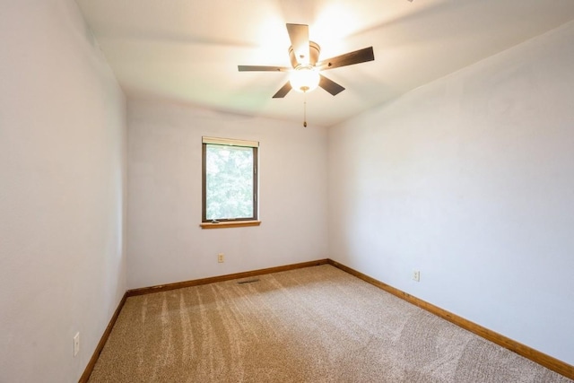 3524 Swallow Ct NE, Cedar Rapids, IA 52402 - spare room featuring light carpet and ceiling fan