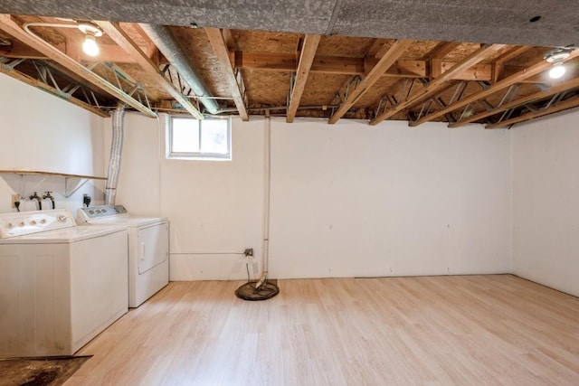3524 Swallow Ct NE, Cedar Rapids, IA 52402 - washroom featuring light wood-style floors and washing machine and dryer