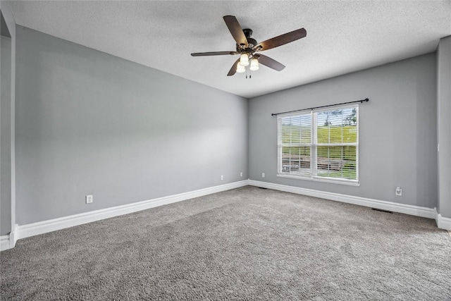 881 Shade Tree Ct, Lisbon, IA 52253 - carpeted spare room featuring a textured ceiling and a ceiling fan