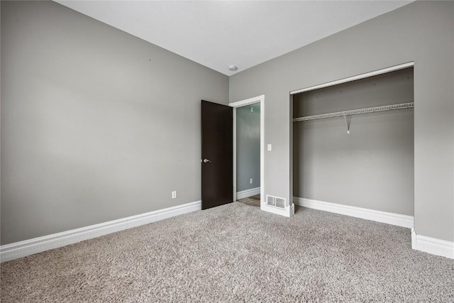 881 Shade Tree Ct, Lisbon, IA 52253 - unfurnished bedroom featuring carpet floors and a closet