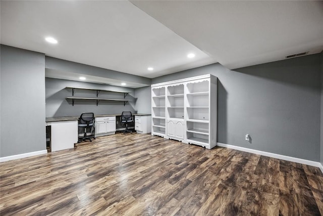 881 Shade Tree Ct, Lisbon, IA 52253 - unfurnished office with recessed lighting, dark wood-style flooring, and built in study area