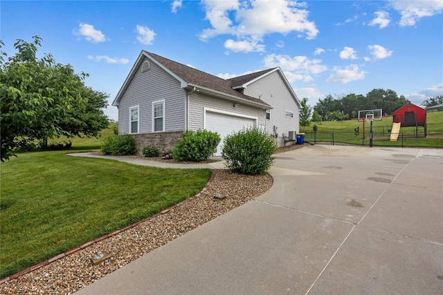 881 Shade Tree Ct, Lisbon, IA 52253 - view of home's exterior with driveway, an attached garage, brick siding, and a shingled roof