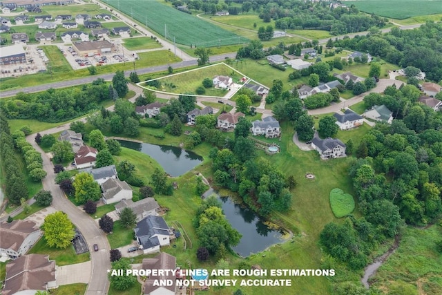 881 Shade Tree Ct, Lisbon, IA 52253 - aerial view of residential area featuring a nearby body of water