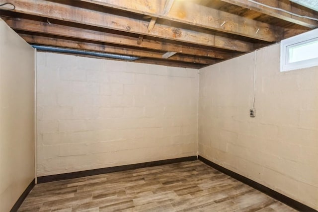 1158 Brown Ave NE, Cedar Rapids, IA 52402 - basement with wood finished floors