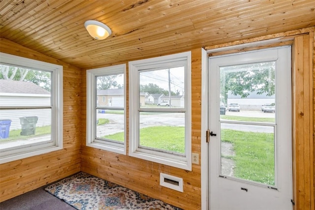 1158 Brown Ave NE, Cedar Rapids, IA 52402 - unfurnished sunroom featuring lofted ceiling