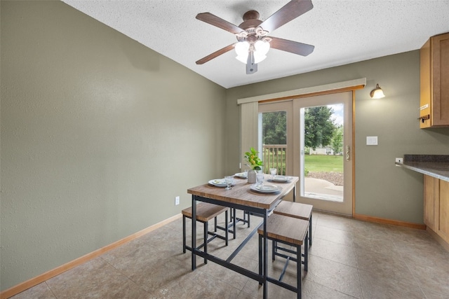 52 Thompson Dr, Palo, IA 52324 - dining area with a ceiling fan and a textured ceiling