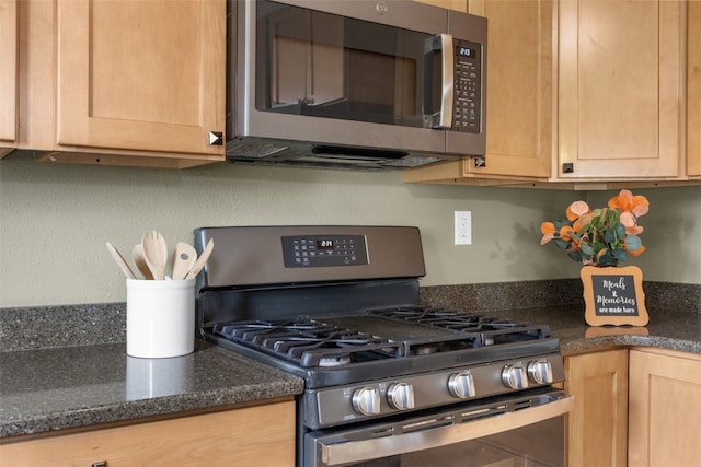 52 Thompson Dr, Palo, IA 52324 - kitchen featuring appliances with stainless steel finishes and light brown cabinetry