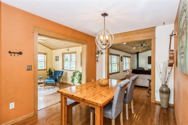 1017 Langenberg Ave, Iowa City, IA 52240 - dining space featuring plenty of natural light, a chandelier, wood finished floors, and a ceiling fan