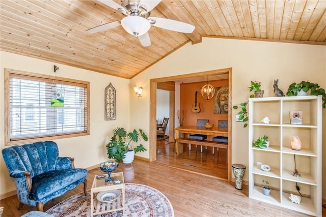1017 Langenberg Ave, Iowa City, IA 52240 - living area featuring wood ceiling, wood finished floors, and ceiling fan