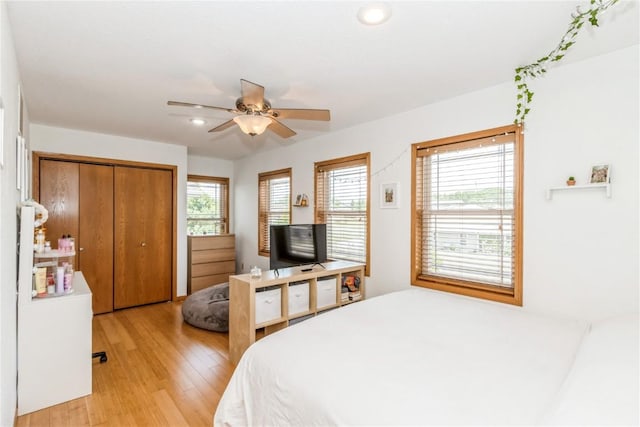 1017 Langenberg Ave, Iowa City, IA 52240 - bedroom featuring light wood-style flooring, recessed lighting, a ceiling fan, and a closet