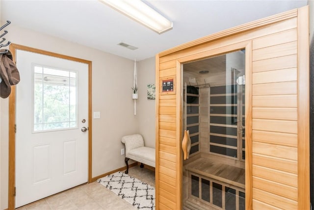 1017 Langenberg Ave, Iowa City, IA 52240 - relaxing sauna / steam room with baseboards and tile patterned flooring