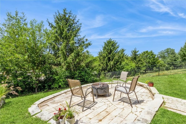 1017 Langenberg Ave, Iowa City, IA 52240 - view of patio / terrace featuring a fire pit