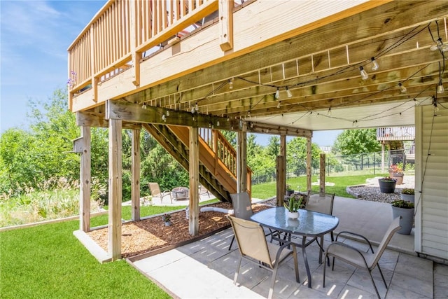 1017 Langenberg Ave, Iowa City, IA 52240 - view of patio / terrace with stairs and outdoor dining space