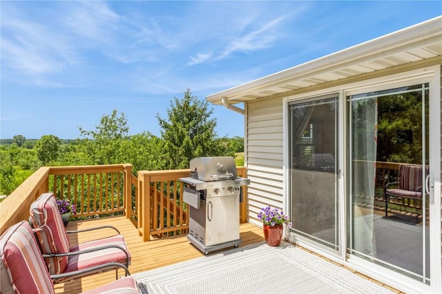 1017 Langenberg Ave, Iowa City, IA 52240 - wooden deck with a grill