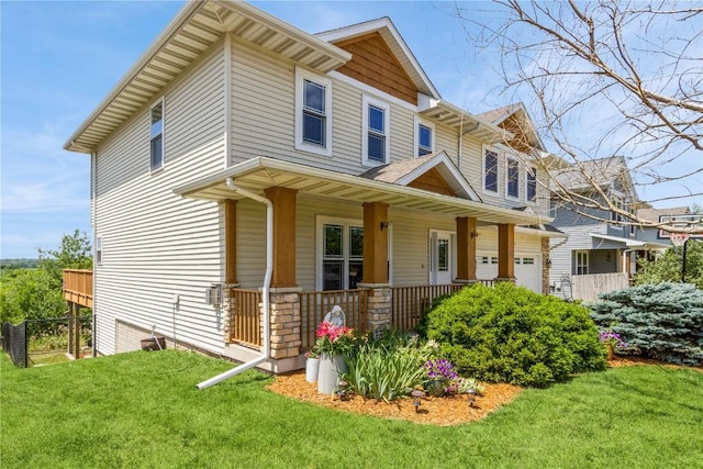1017 Langenberg Ave, Iowa City, IA 52240 - view of front of home with covered porch and a garage