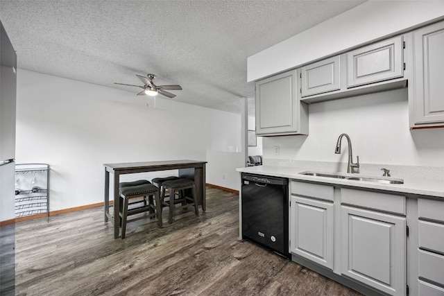 1211 Cambria Ct, Iowa City, IA 52246 - kitchen with black dishwasher, ceiling fan, dark wood-style floors, gray cabinets, and a textured ceiling