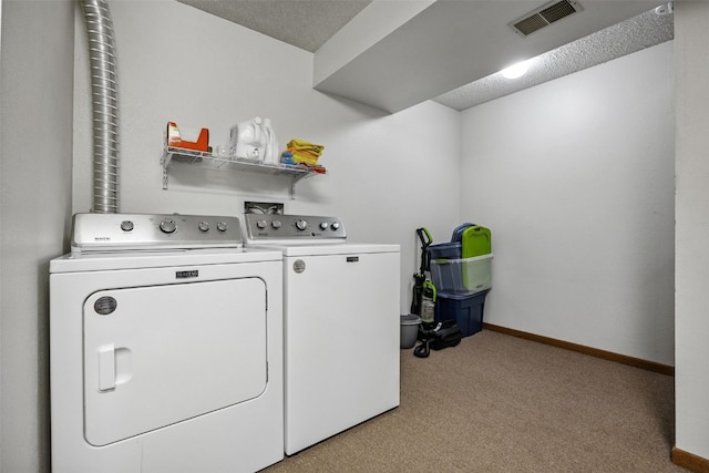 1211 Cambria Ct, Iowa City, IA 52246 - laundry area with separate washer and dryer and light carpet