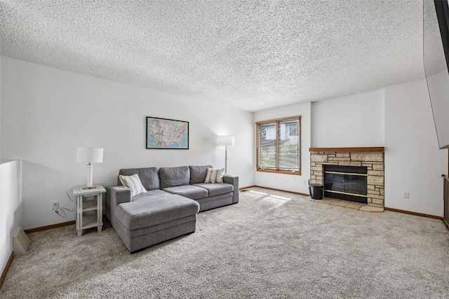 1211 Cambria Ct, Iowa City, IA 52246 - living area featuring carpet floors, a textured ceiling, and a fireplace