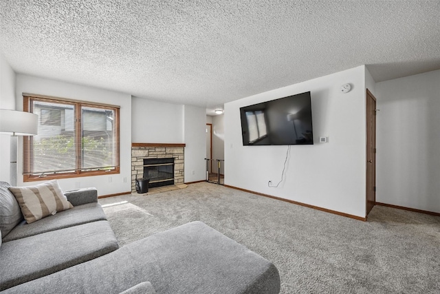 1211 Cambria Ct, Iowa City, IA 52246 - carpeted living area featuring a textured ceiling and a fireplace