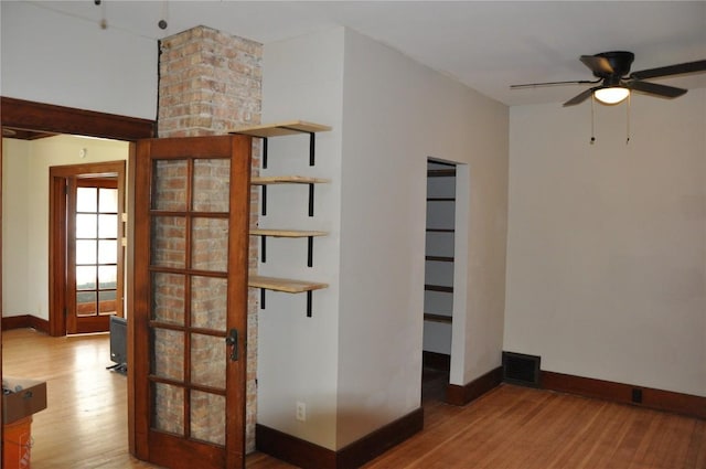 1535 SE 6th Ave, Cedar Rapids, IA 52403 - spare room featuring wood finished floors and ceiling fan