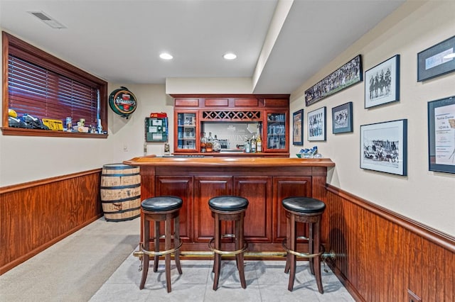 927 Southlawn Dr, Iowa City, IA 52245 - indoor dry bar with a wainscoted wall, wooden walls, and recessed lighting