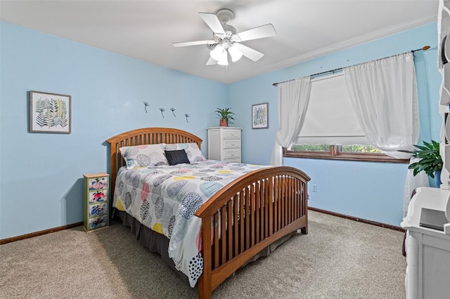 927 Southlawn Dr, Iowa City, IA 52245 - carpeted bedroom featuring baseboards and ceiling fan