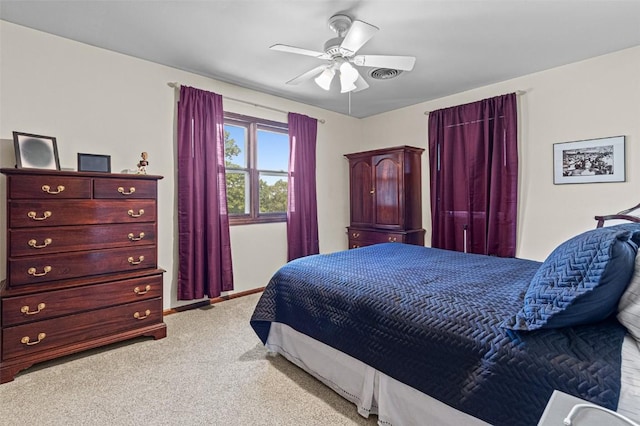 927 Southlawn Dr, Iowa City, IA 52245 - bedroom with light carpet and a ceiling fan