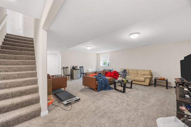 281 Danielle St, Iowa City, IA 52245 - carpeted living room featuring stairs