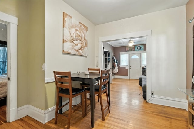 420 16th St NE, Cedar Rapids, IA 52402 - dining room featuring light wood-type flooring and baseboards